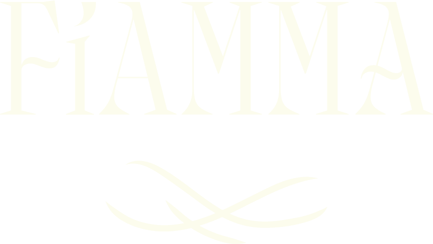 Large, pale yellow text reading FIAMMA is centered at the top of the image, evoking the elegant ambiance of a luxury restaurant. Below the text, there is a decorative, curved double underline. The background is light gray. Fiamma Sun Valley | Italian