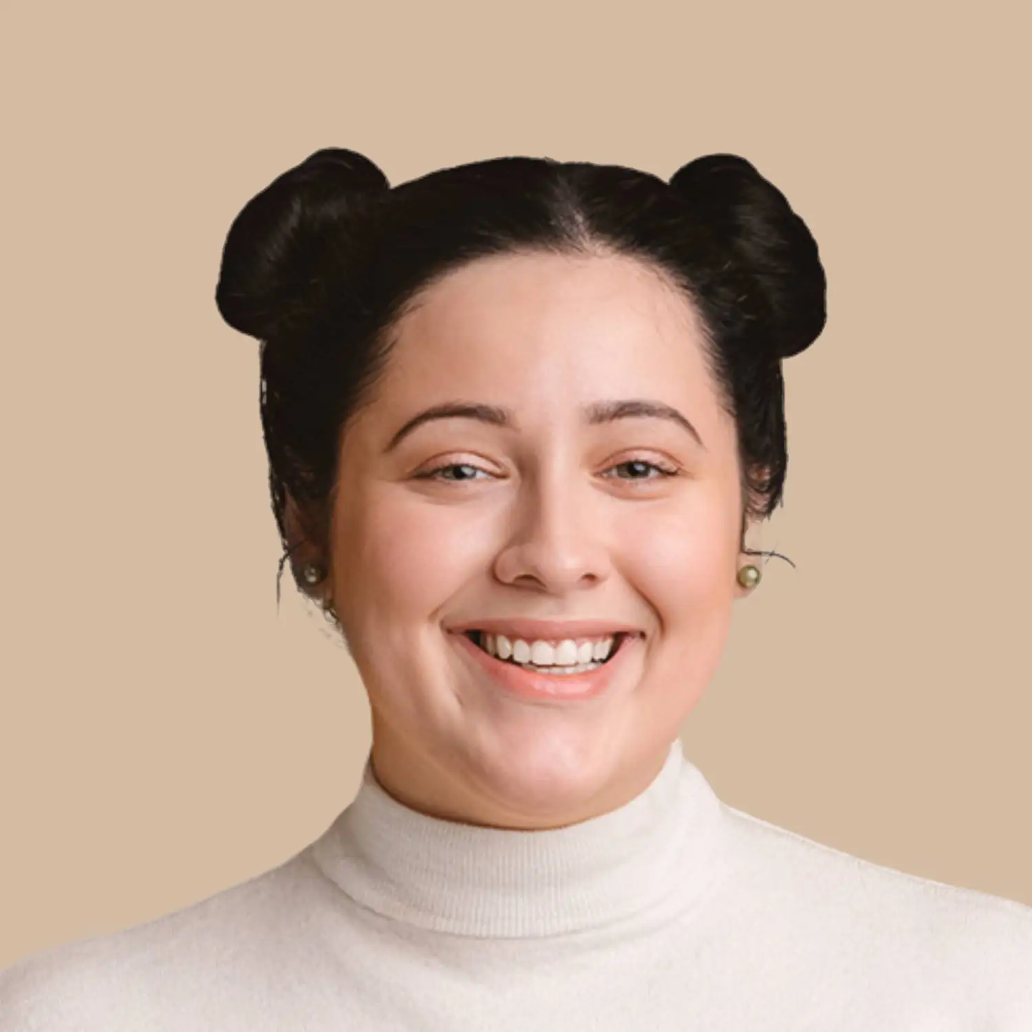 A smiling person with dark hair in two buns, wearing a white turtleneck sweater, posed against a beige background. Fiamma Sun Valley | Italian