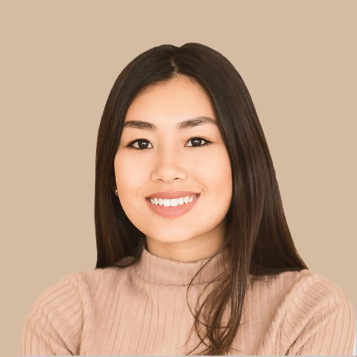 A woman with long dark hair, wearing a beige ribbed turtleneck sweater, smiles at the camera against a plain beige background. Fiamma Sun Valley | Italian